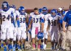 Copperas Coach head coach jack Welch leads his defense on the field during their game Friday against Belton. The Bulldawgs will host Ellison for senior night tonight.