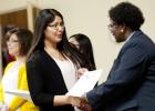 Copperas Cove ISD Board of Trustees secretary Inez Faison, right, presents Ashley Solis with her Campus Hero certificate for the volunteer works she along with 25 others were honored Friday.