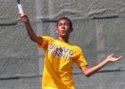 Copperas Cove’s Dominic Smith hits a forehand volley during his game against Pfugerville’s Adam Compton on Friday. Cove split matches with Killeen and Pflugerville to move to 4-1 on the season in team tennis.