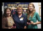 Chamber of Commerce President Betty Price,left, updated the Morning Exchange Club on state of the Chamber at the request of Marty Smith,center. Rabbit Fest royalty Kelsey Dane shared her platform of volunteer service with the club.