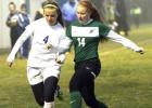 Copperas Cove junior Ali McBride battles for possession with Ellison’s Billie Nail during their 12-6A contest on Monday. The Lady Dawgs are one win away from a return trip to the playoffs. They host Harker Heights tonight for senior night before closing out the season at Shoemaker.